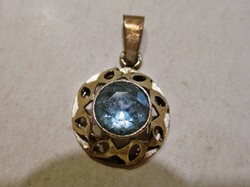 Beautiful 14kt gold pendant with a large genuine aquamarine stone