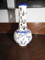 Old openwork blue painted vase