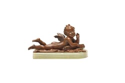 Bronze putto on a marble base