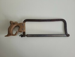 Old vintage metal saw industrial tool