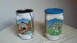 Two old metal / tin boxes with rural buildings on the side (there is only one roof)