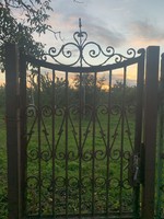 Wrought iron fence gate
