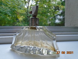 Antique polished, faceted crystal art-deco perfume bottle with once silver-plated metal fitting