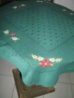 Beautiful Christmas-winter tablecloth embroidered with small cross stitches