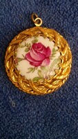 Vintage porcelain pendant in the shape of a painted rose in a beautiful gilded frame