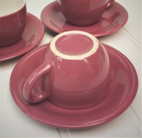 Granite coffee, cappuccino and tea cups with plates