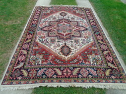 Hand-knotted old thick oriental wool rug in good condition