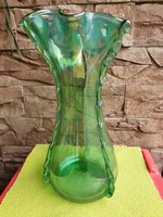 A huge broken glass vase
