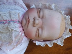 Marked porcelain doll for sale, negotiable