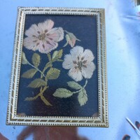 Small embroidered picture in a copper frame