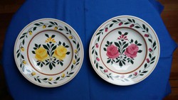 Two floral ceramic wall plates (granite?)