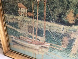 C. Monet print in glazed wooden frame