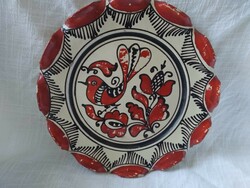 Korondi bird, red wall plate