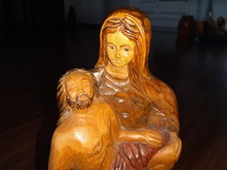Carved statue of Christ and Mary