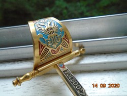 Two-headed imperial eagle with coat of arms of Toledo handmade with colorful enamel and gold ornamental sword