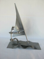 Loft design metal surfer figure