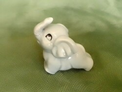 Lovely, small, raised trunk porcelain elephant figure, sculpture, hand painted