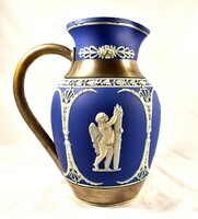 XX. Antique ceramic wine jug with wedgwood metal fittings