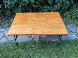 Wooden table with wire legs