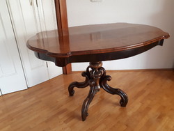 Antique coffee table with spider legs restored