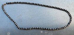 Black - white string of pearls necklace