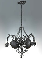 Wrought iron chandelier with plastic dragons