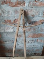 Very old pointed wooden compass, carpenter's or cooper's compass