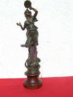 Dancing woman statue