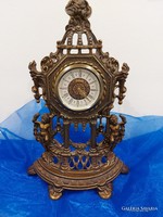 Old copper mantel clock.