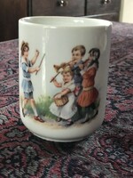 A beautiful and very old mug with a scene