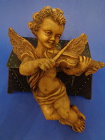 Musical angel figure, with a nice patina