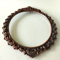 Old oval neo-baroque metal wall-hung mirror or photo frame