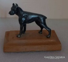 Old German boxer dog statue.