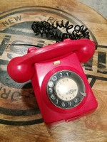 Red dial telephone with retro black dial