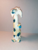 Incense holder with a cheeky ceramic giraffe with a small bird