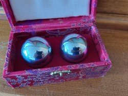 Chikung balls in a gift box covered with Chinese fabric