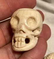 Antique old Japanese netsuke bone carving skull figurine