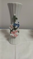 Vintage German porcelain vase with colorful flower decoration. Ribbed body, unmarked.