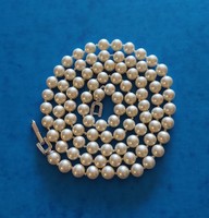 Beautiful pierre lang tekla string of pearls with zircon stone decorative clasp