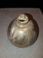 An old, marked, spherical luster glazed Chinese ceramic vase