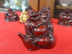 Religious laughing Buddha plastic statue.