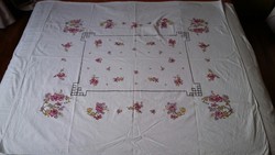 Floral linen tablecloth on a white background