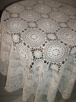 Beautiful antique white hand-crocheted floral round tablecloth with Art Nouveau features