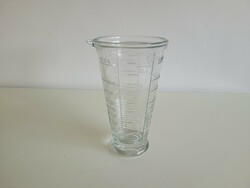 Old retro kitchen glass measuring cup with vintage thick glass measuring cup