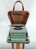 Hermès baby green typewriter