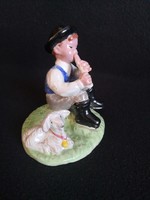 Izsépy ceramics - a shepherd playing a flute with a small lamb