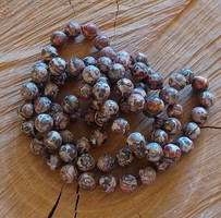 Long leopard jasper necklace with knotted lacing