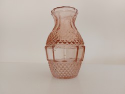 Old glass vase in pink vintage vase