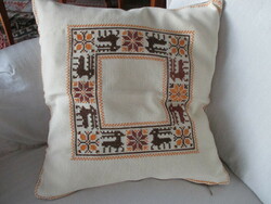 Cross-stitch cushion with antiquing deer embroidery