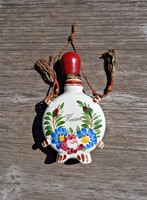 Small ceramic souvenir with Kassa inscription, water bottle